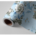 N&deg;250 Papier peint Fleurs grises sur fond bleu